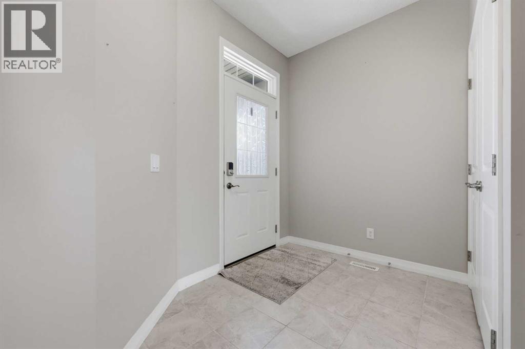 58 Kingfisher Crescent Se, Airdrie, Alberta  T4A 0X5 - Photo 3 - A2312452
