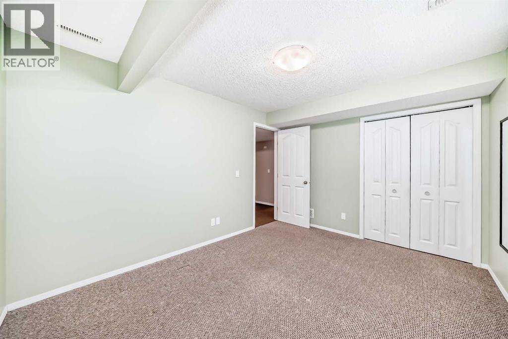 208 Stonegate Crescent Nw, Airdrie, Alberta  T4B 2V3 - Photo 29 - A2314968