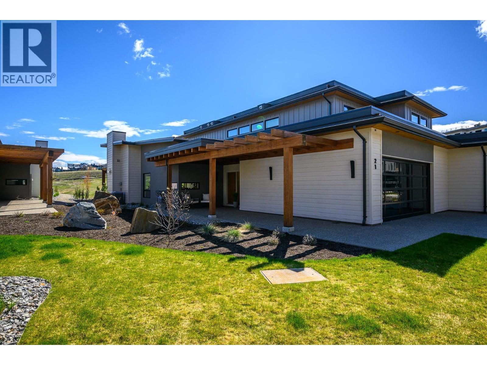 105 Predator Ridge Drive Unit# 21, Vernon, British Columbia  V1H 0A5 - Photo 1 - 10376677