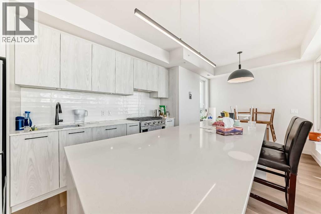310, 1107 Gladstone Road Nw, Calgary, Alberta  T2N 3T1 - Photo 9 - A2315932