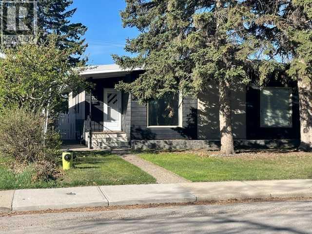 2713 Canmore Road Nw, Calgary, Alberta  T2M 4J6 - Photo 1 - A2278776