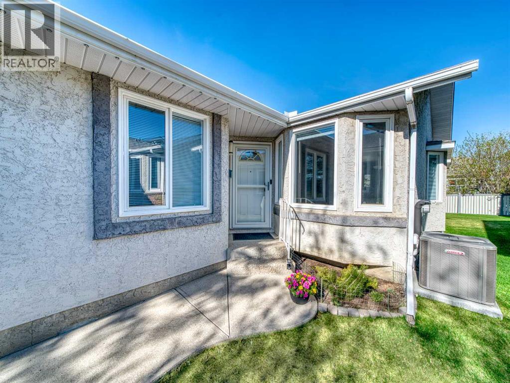 301 Arbour Cliff Close Nw, Calgary, Alberta  T3G 3W8 - Photo 2 - A2284425
