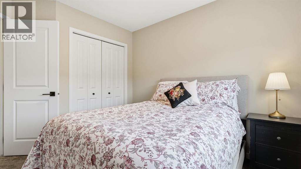 77 Wolf Gate, Okotoks, Alberta  T1S 5T9 - Photo 27 - A2311588