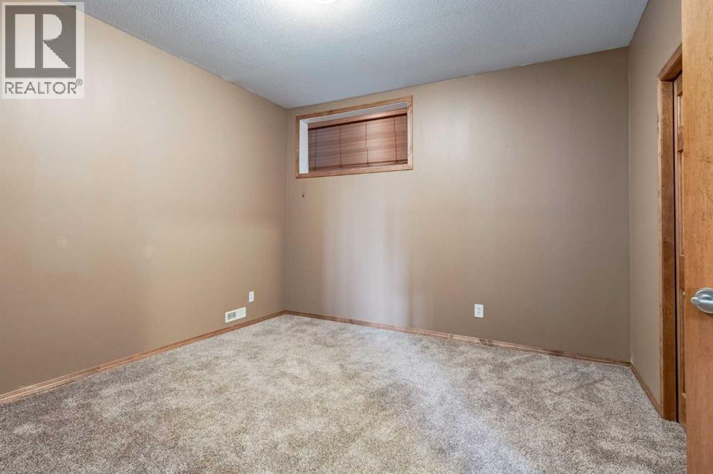 15 Barber Street NW, Langdon, Alberta  T0J 1X2 - Photo 36 - A2309366