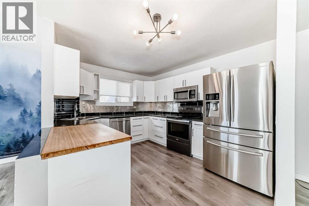 6824 Temple Drive Ne, Calgary, Alberta  T1Y 4X8 - Photo 5 - A2309613