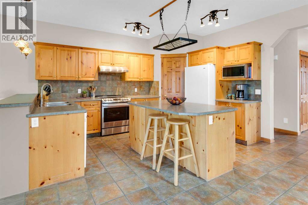 124 Gleneagles Terrace, Cochrane, Alberta  T4C 1W6 - Photo 24 - A2314525