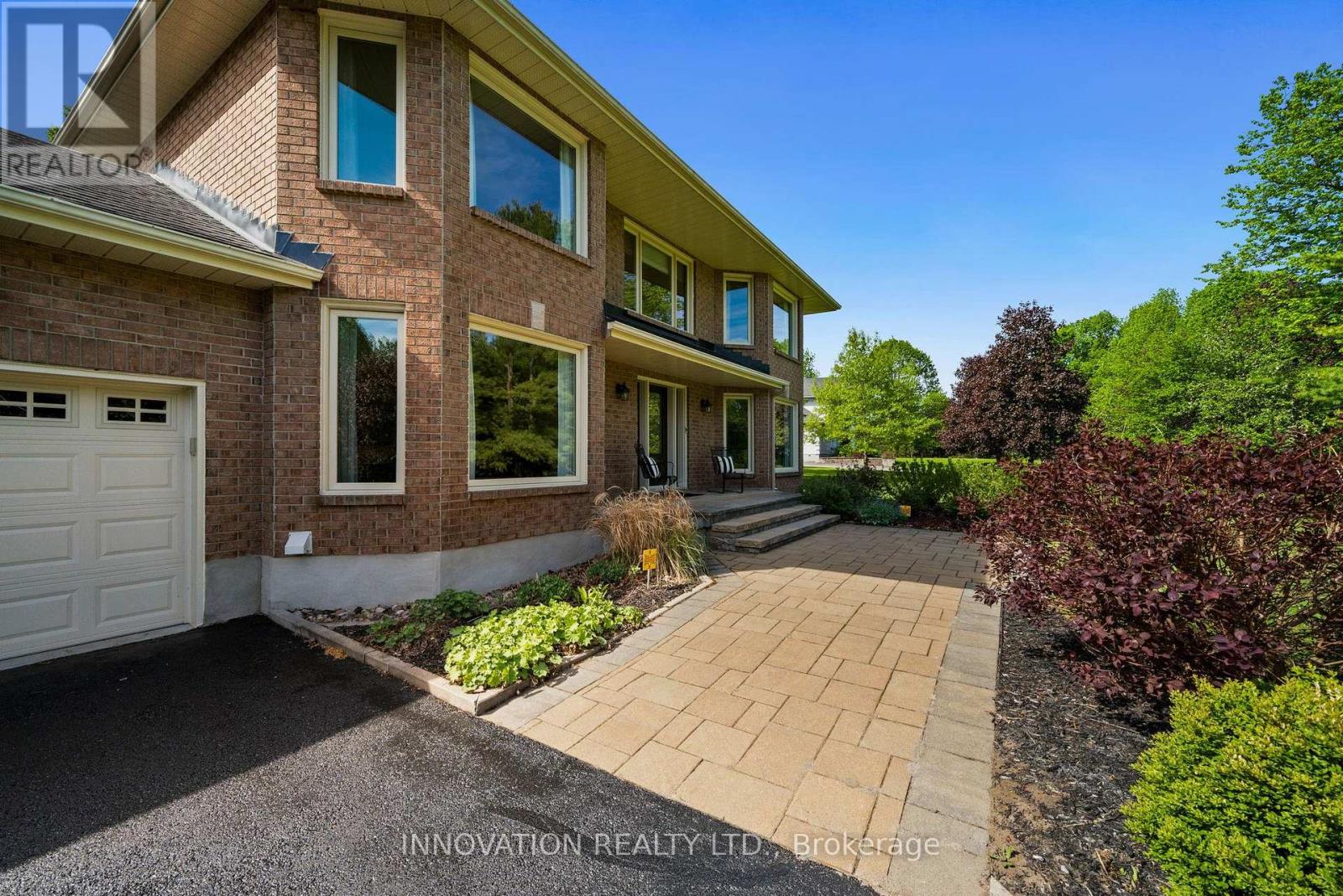 1410 Sherruby Way, Ottawa, Ontario K2W 1B1 - Photo 2 - X13212474