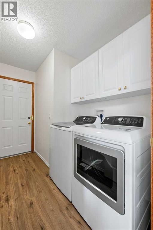 125 Woodpark Close Sw, Calgary, Alberta  T2W 6H1 - Photo 26 - A2313625