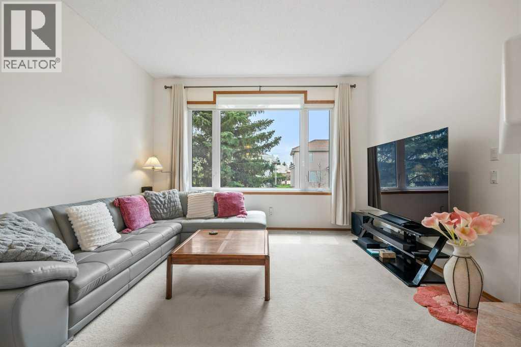 125 Woodpark Close Sw, Calgary, Alberta  T2W 6H1 - Photo 13 - A2313625