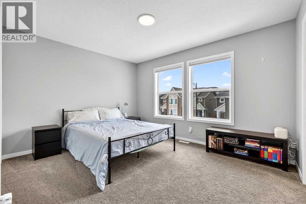 94 Wolf Gate Nw, Okotoks, Alberta  T1S 5T9 - Photo 26 - A2296593