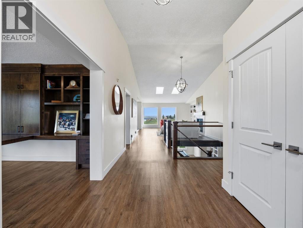 7 Bearspaw Pointe Green, Rural Rocky View County, Alberta  T3L 2P6 - Photo 6 - A2315964