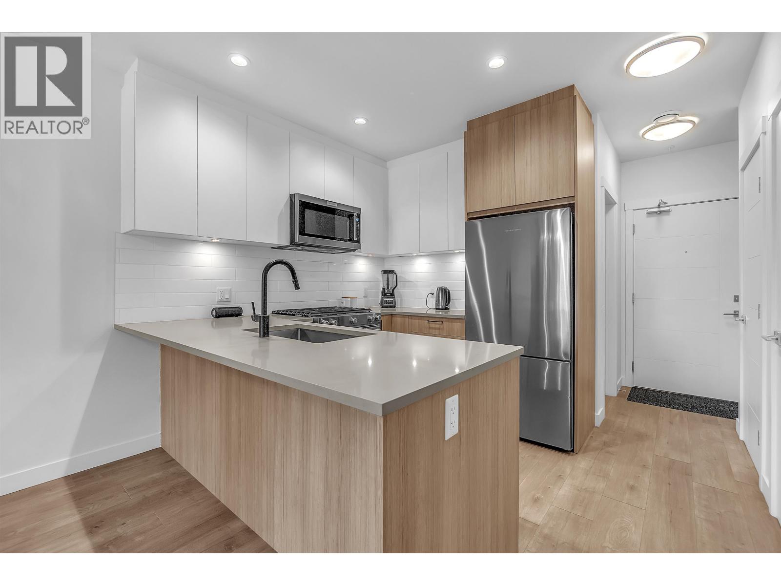212 707 Como Lake Street, Coquitlam, British Columbia  V3J 0J5 - Photo 5 - R3129606