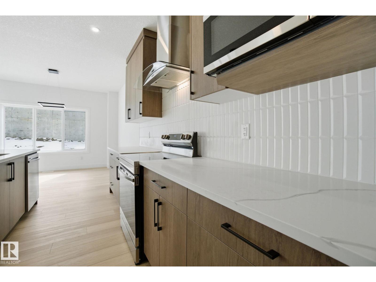 1405 Osprey Ct NW, Edmonton, Alberta  T5M 0M2 - Photo 7 - E4475118