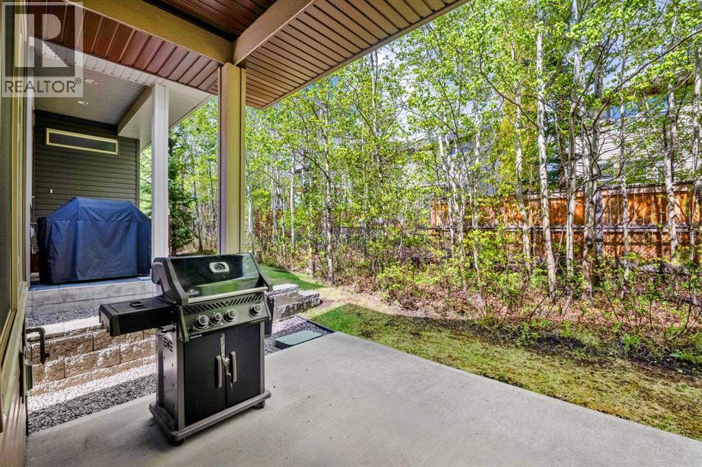 63 Cortina Villas Sw, Calgary, Alberta  T3H 0W8 - Photo 4 - A2314467