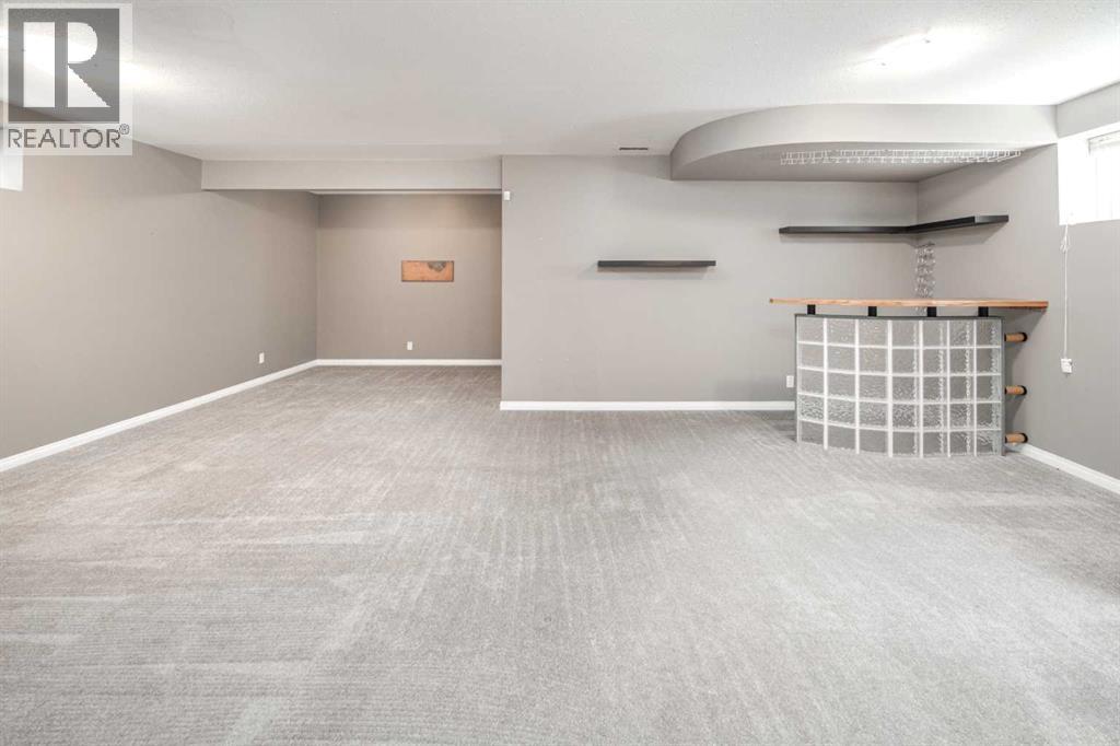 32 Cougarstone Square Sw, Calgary, Alberta  T3H 5J4 - Photo 29 - A2301938