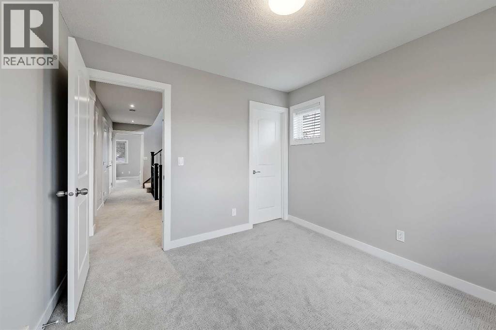 3233 Cochrane Road Nw, Calgary, Alberta  T2M 4J4 - Photo 29 - A2308706