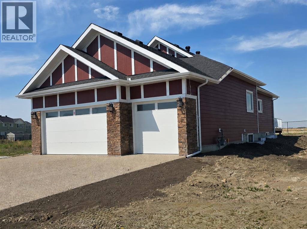 376 Muirfield Crescent, Lyalta, Alberta  T0J 1Y1 - Photo 4 - A2312285