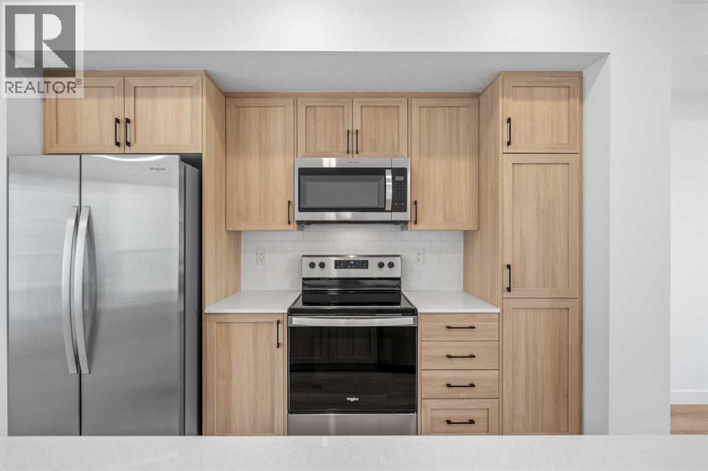 1007, 25 Wildwoods Court Sw, Airdrie, Alberta  T4B 5V7 - Photo 11 - A2314215