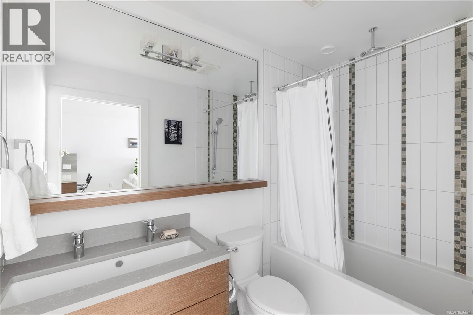 202 2580 Penrhyn St, Saanich, British Columbia  V8N 1G3 - Photo 10 - 1036874