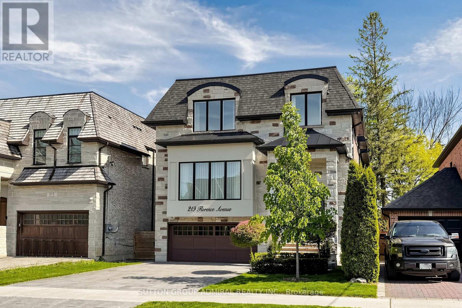 <div class="slider-price">$2,939,000</div><p>219 Florence Avenue, Toronto, Ontario</p>