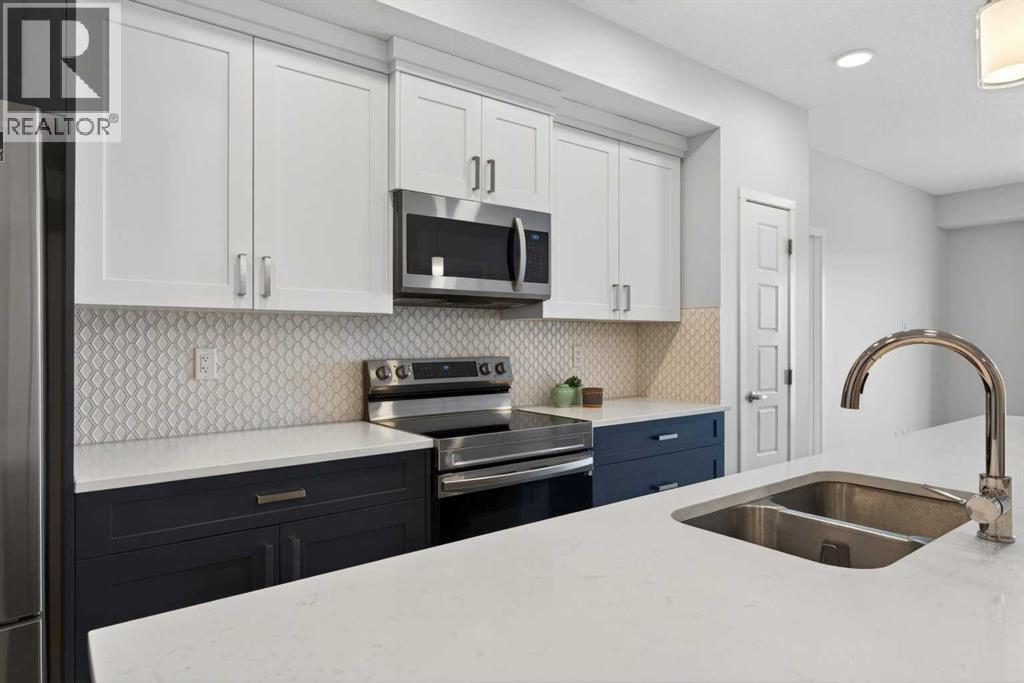305, 200 Harvest Hills Place NE, Calgary, Alberta T2M 0C8 - Photo 7 - A2283997