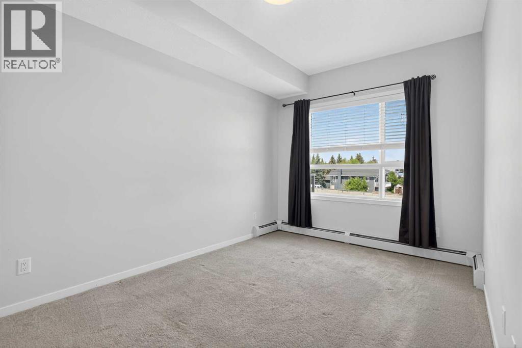 305, 200 Harvest Hills Place NE, Calgary, Alberta T2M 0C8 - Photo 14 - A2283997