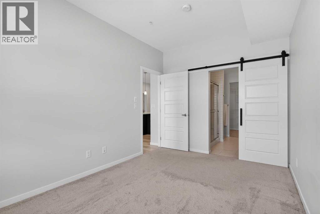 305, 200 Harvest Hills Place NE, Calgary, Alberta T2M 0C8 - Photo 15 - A2283997