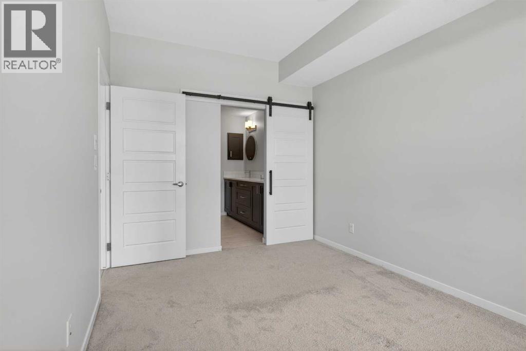 305, 200 Harvest Hills Place NE, Calgary, Alberta T2M 0C8 - Photo 16 - A2283997