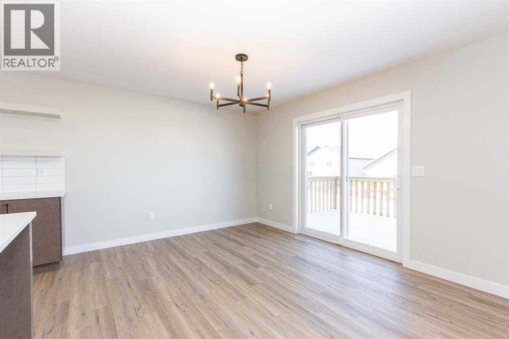 655 Robinson Avenue, Penhold, Alberta  T0M 1R0 - Photo 13 - A2312933