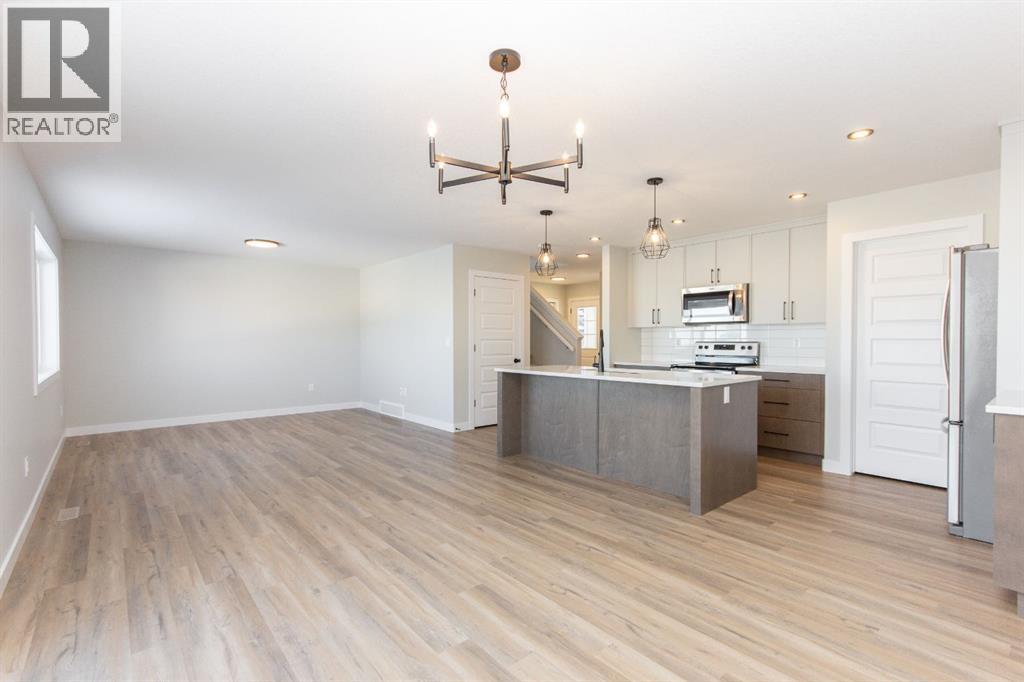 655 Robinson Avenue, Penhold, Alberta  T0M 1R0 - Photo 14 - A2312933
