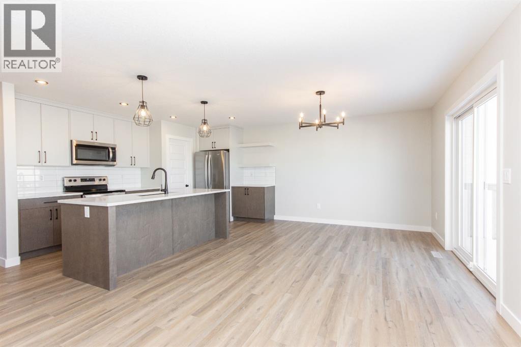 655 Robinson Avenue, Penhold, Alberta  T0M 1R0 - Photo 16 - A2312933