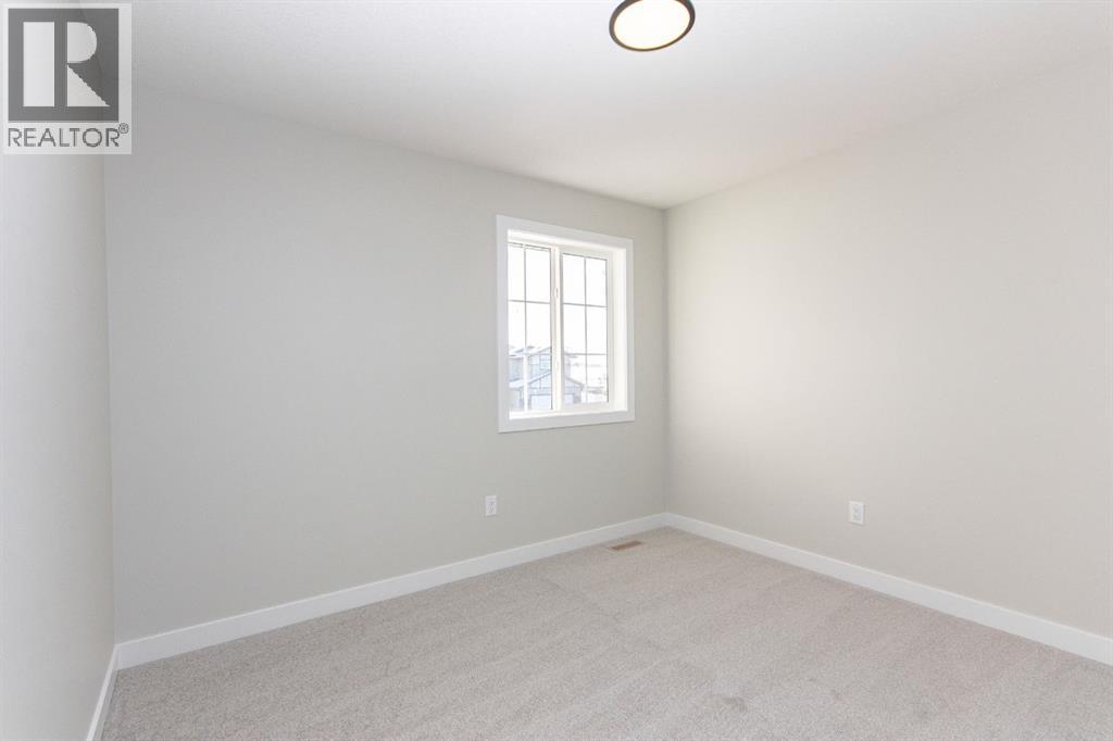 655 Robinson Avenue, Penhold, Alberta  T0M 1R0 - Photo 18 - A2312933