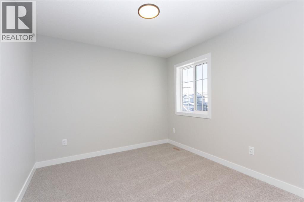 655 Robinson Avenue, Penhold, Alberta  T0M 1R0 - Photo 19 - A2312933