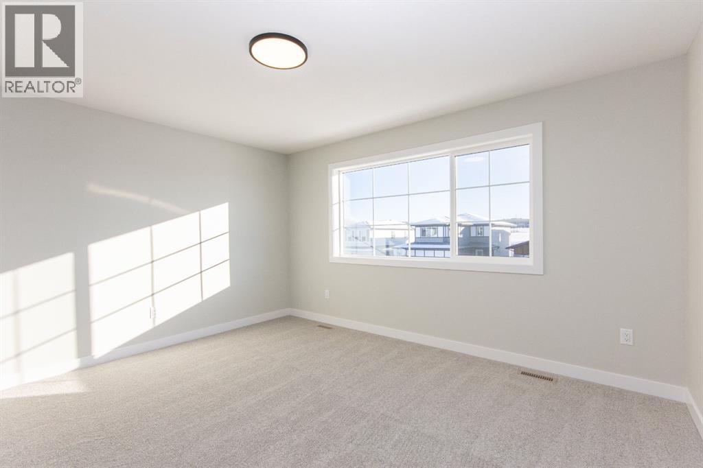 655 Robinson Avenue, Penhold, Alberta  T0M 1R0 - Photo 27 - A2312933