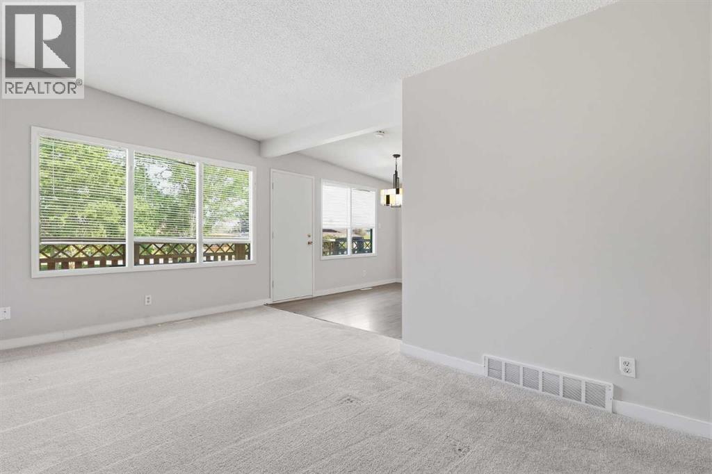 11759 Canfield Road Sw, Calgary, Alberta  T2W 1J6 - Photo 4 - A2307595
