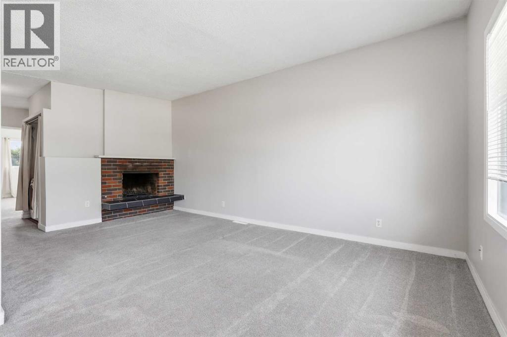 11759 Canfield Road Sw, Calgary, Alberta  T2W 1J6 - Photo 5 - A2307595