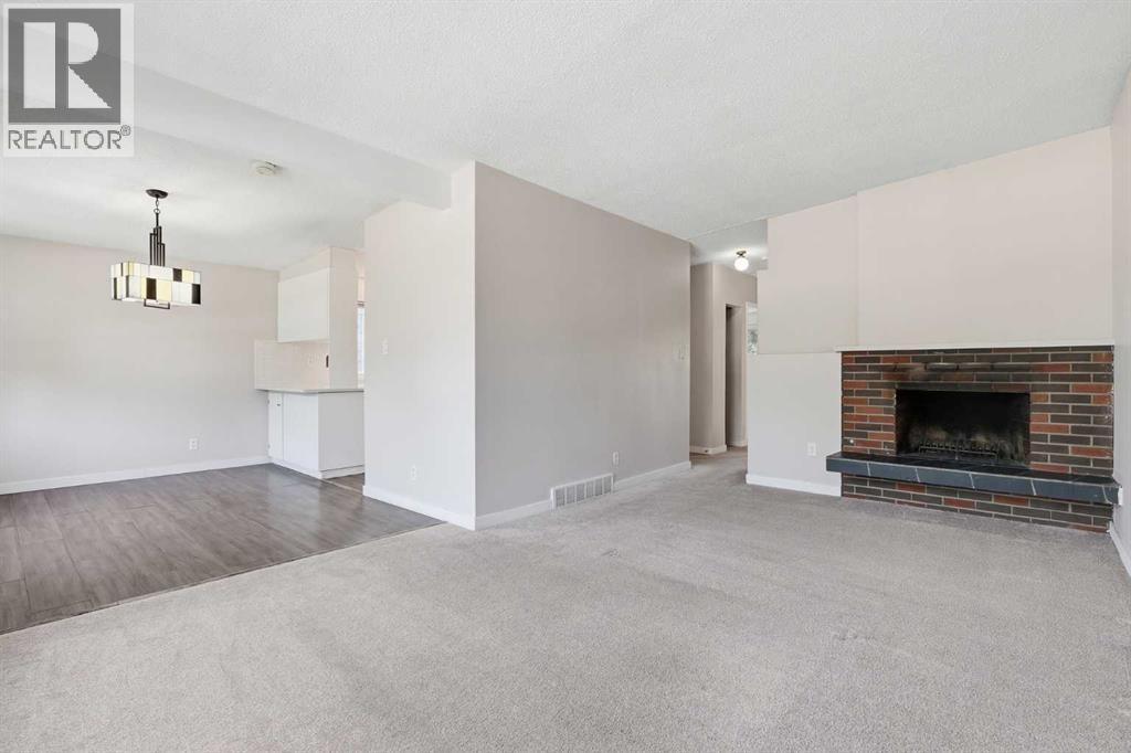11759 Canfield Road Sw, Calgary, Alberta  T2W 1J6 - Photo 3 - A2307595