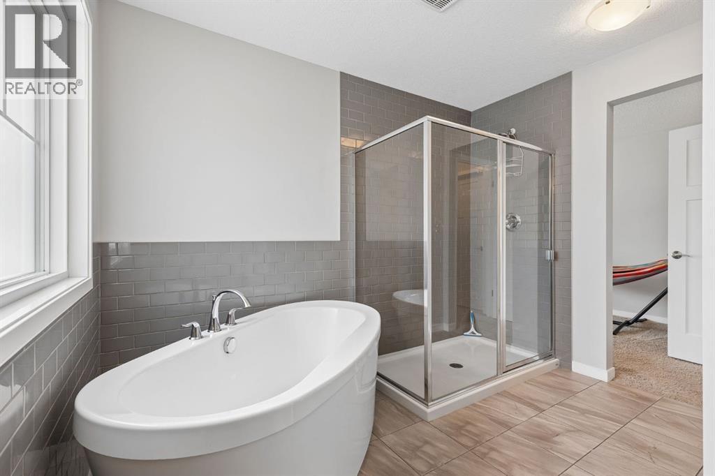 65 Fireside Crescent, Cochrane, Alberta T4C 2L4 - Photo 14 - A2315181