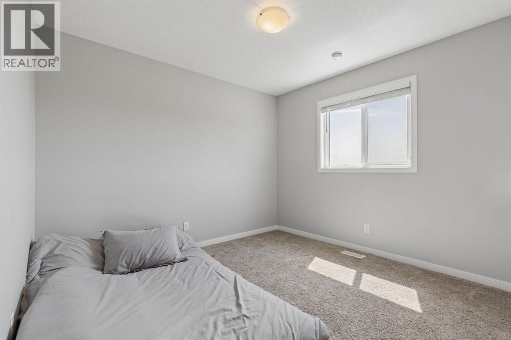 65 Fireside Crescent, Cochrane, Alberta T4C 2L4 - Photo 19 - A2315181