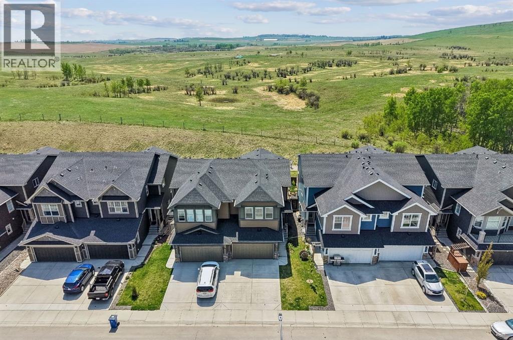 65 Fireside Crescent, Cochrane, Alberta T4C 2L4 - Photo 2 - A2315181