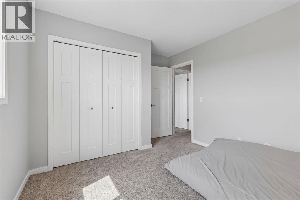 65 Fireside Crescent, Cochrane, Alberta T4C 2L4 - Photo 20 - A2315181