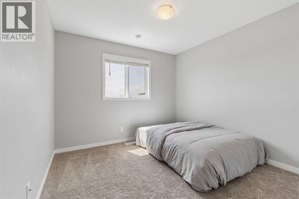 65 Fireside Crescent, Cochrane, Alberta T4C 2L4 - Photo 21 - A2315181