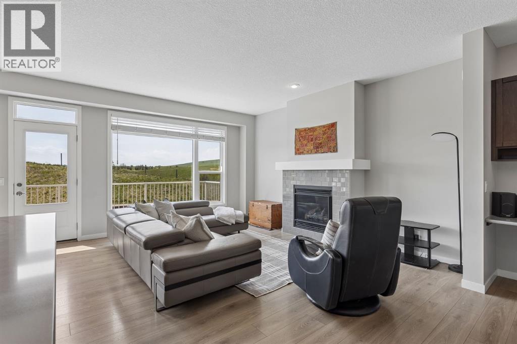 65 Fireside Crescent, Cochrane, Alberta T4C 2L4 - Photo 7 - A2315181