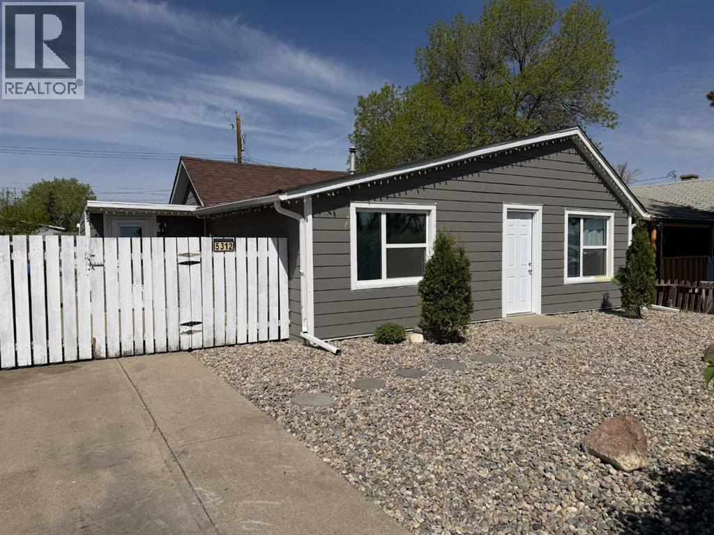 5312 57 Street, Taber, Alberta  T1G 1L7 - Photo 2 - A2310338