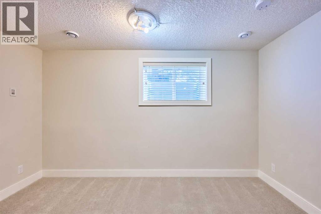 2940 Blakiston Drive NW, Calgary, Alberta  T2L 1L6 - Photo 26 - A2307557
