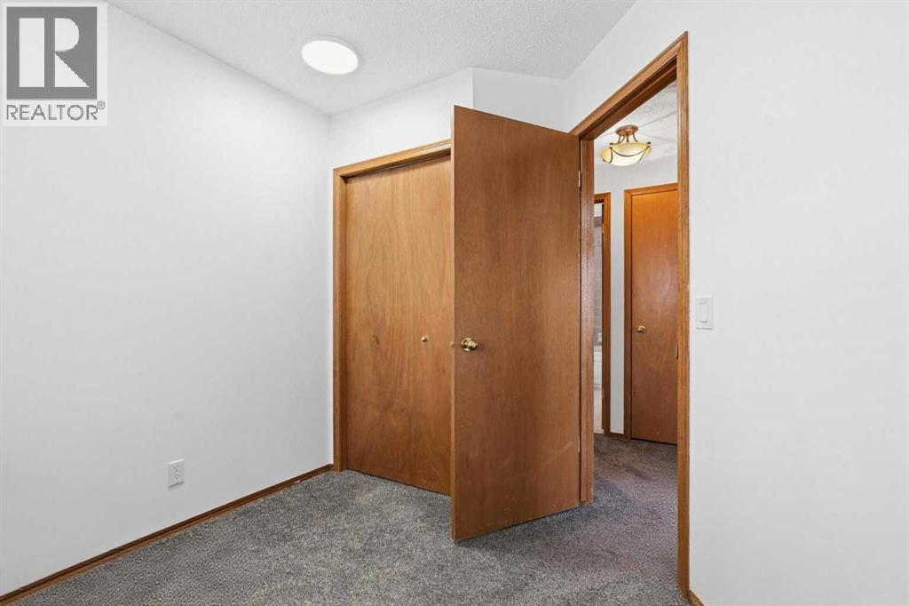 672 Macewan Drive NW, Calgary, Alberta  T3K 3J5 - Photo 19 - A2313677