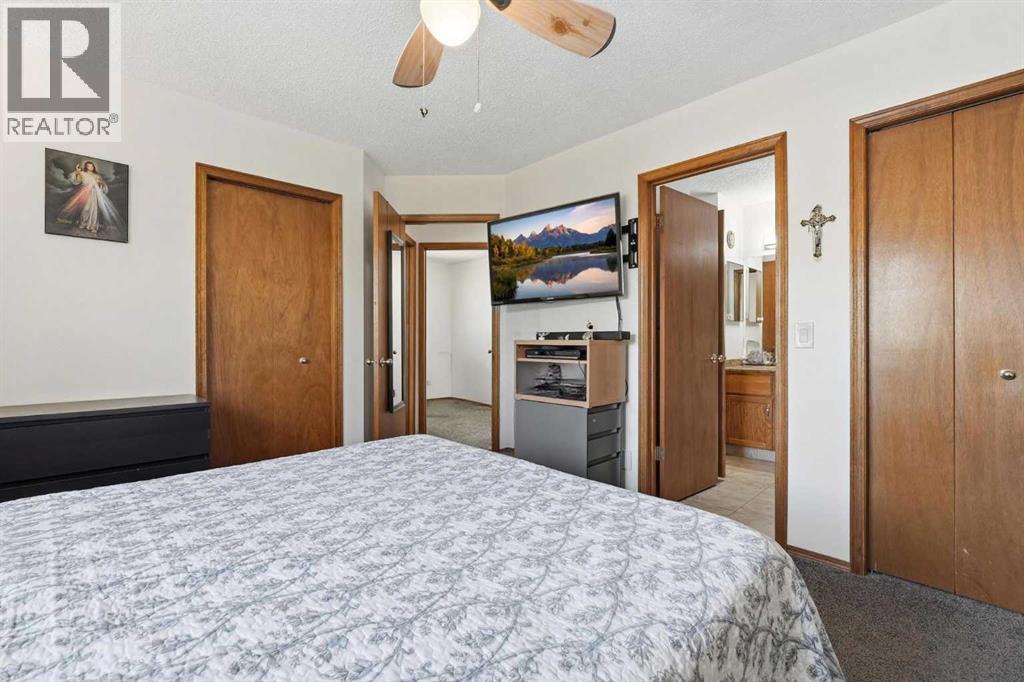 672 Macewan Drive NW, Calgary, Alberta  T3K 3J5 - Photo 14 - A2313677