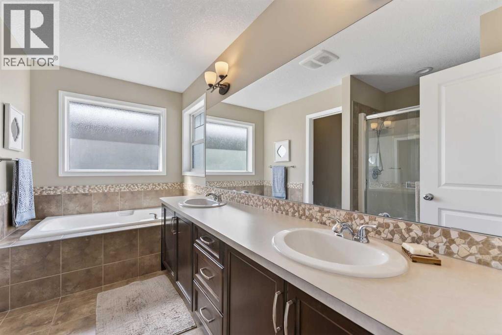 183 Reunion Grove Nw, Airdrie, Alberta  T4B 0Z3 - Photo 22 - A2314108