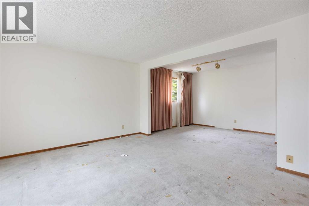 608 Aboyne Crescent NE, Calgary, Alberta  T2A 5Y8 - Photo 3 - A2315637