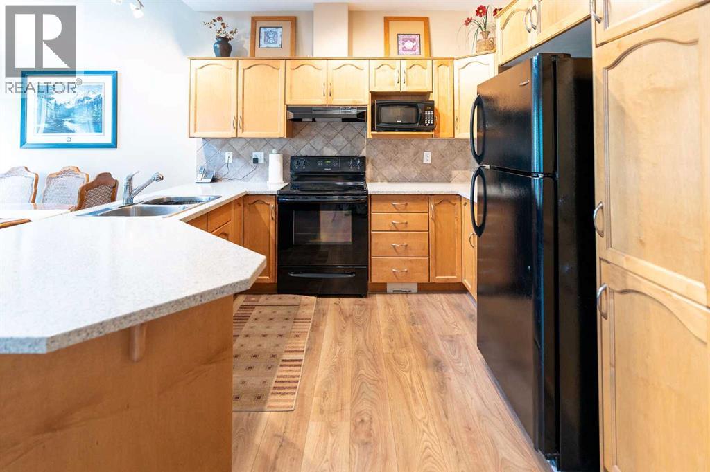 22 Rockyvalley Villas NW, Calgary, Alberta  T3G 5X3 - Photo 6 - A2314192